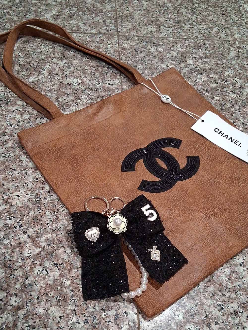 Chanel Uniform Tote Brown Faux Leather Tote with Black Logo.Comes W/Bag Charm.